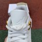 Nike Air Jordan 4 with Metallic Gold