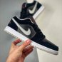 jordan 1 low blackuniversity red-cement grey 553558-032