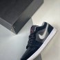 jordan 1 low blackuniversity red-cement grey 553558-032