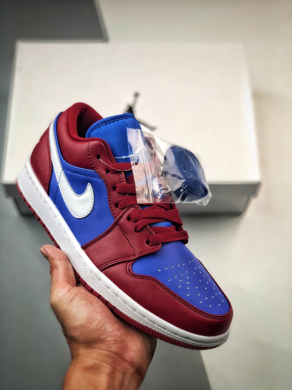 jordan 1 low pomegranatemedium blue-white dc0774-604