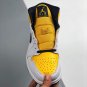 jordan 1 mid whiteblack-university gold