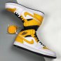 jordan 1 mid whiteuniversity gold-black 554724-170