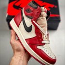 jordan 1 retro high og âchicago reimaginedâ varsity redblacksailmuslin
