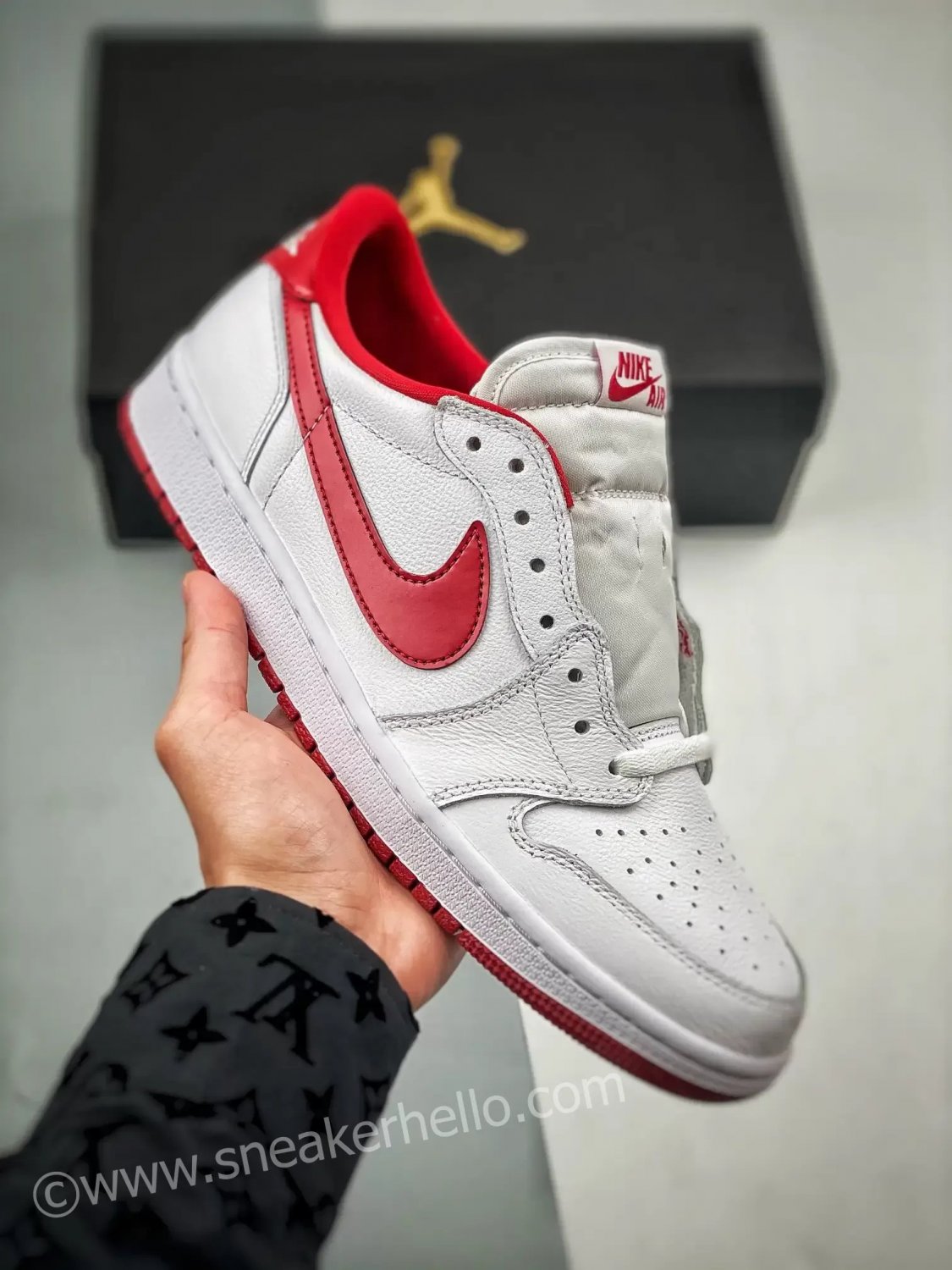 jordan 1 retro low og white varsity red 705329-101