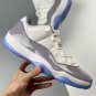 jordan 11 low whiteuniversity bluecement grey av2187-140