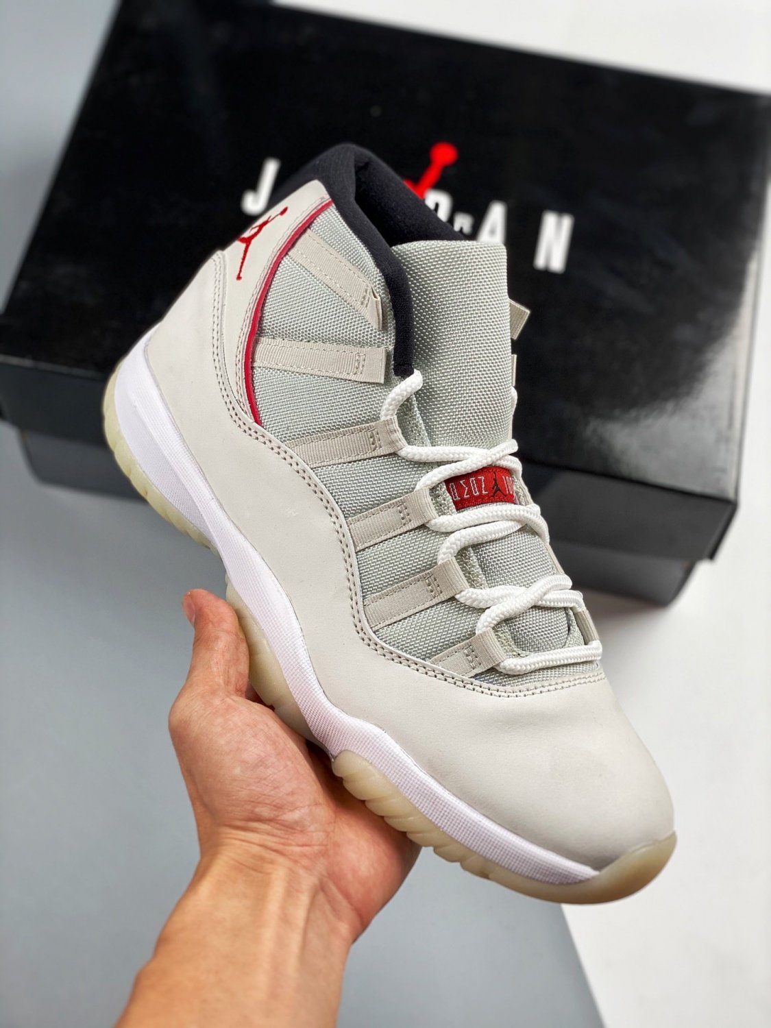 jordan 11 platinum tintsail-university red