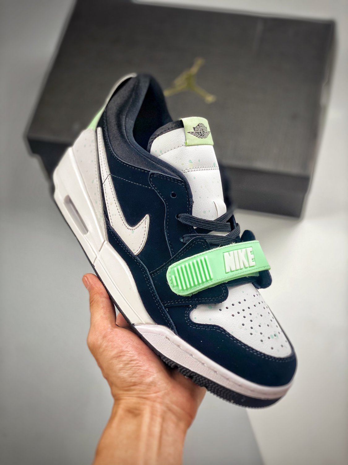 jordan legacy 312 low black white teal tint