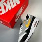 nike air max 1 whiteuniversity gold-black fd9082-104