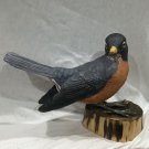 American robin. Bird carving