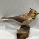 Horned lark. Bird carving