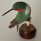 Bird carving: male ruby-throated hummingbird.