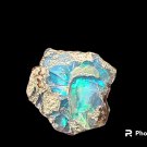AAA Ethiopian Fire Opal, VIVID Red Green and Blue Fire 16mm x 18mm 1.16g