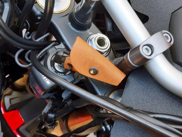 Handcrafted Leather Key Fob: A Stylish Solution to Protect Your Motorcycle's Paint