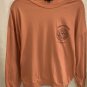 bright orange top