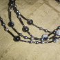 multi colored black grey necklace