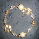 gold and ivory pearl beaded bracelet