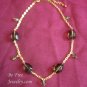 Gold and olive green beaded necklace