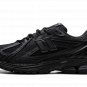1906R "Comme des Garcons Homme Black"
