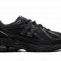 1906R "Comme des Garcons Homme Black"