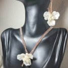 Rose Gold necklace and earring set with faux pearl and rhinestone cream colored flowers