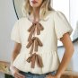 White Textured Bow Ties Front Bubble Hem Puff Short Sleeve Blouse