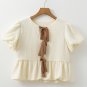 White Textured Bow Ties Front Bubble Hem Puff Short Sleeve Blouse