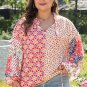 Orange Floral Geometric Patchwork Lace Up Crewneck Plus Size Blouse