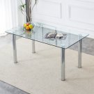 A modern minimalist style glass dining table. Transparent tempered glass tabletop