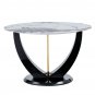 A modern minimalist circular Pandora style sintered stone table top with a diameter of 48 inches
