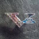 V 8 emblem ornament