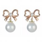 14K Rose Gold Open Bow and Dangle Pearl Screw Back Earrings In 14K