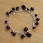 B022: Black & Silver Glass Bead Charm Bracelet