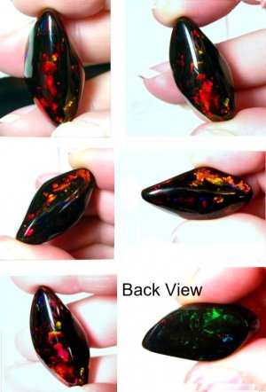WORLD CLASS SOLID 31 CARAT NEON COLOR FLASH BLACK OPAL!