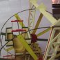 Vintage Wood Structured Ferris Wheel with four padded cars, hand crank