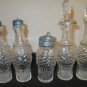 EARLY 1900's SILVER PLATE CASTOR SET WITH 5 MATCHING GLASS CONTAINERS