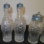 EARLY 1900's SILVER PLATE CASTOR SET WITH 5 MATCHING GLASS CONTAINERS