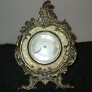 VINTAGE ENDURA FLORAL BRASS ROUND ALARM CLOCK FOOTED WEST GERMANY