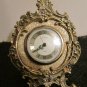 VINTAGE ENDURA FLORAL BRASS ROUND ALARM CLOCK FOOTED WEST GERMANY