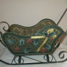 DOLL SLEIGH ALL METAL CHRISTMAS DECORATED ON SIDES