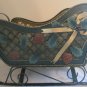 DOLL SLEIGH ALL METAL CHRISTMAS DECORATED ON SIDES