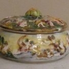 R. CAPODIMONTE LIDDED BOWL,   NUDE CHERUBS,