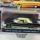 1: 64 1973 Cadillac Coupe DeVille green wheel car black models version