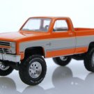 Diecast 1986 Chevy K 10 Silverado Square Body 1:64 Scale Truck Lifted 4X4
