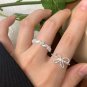 Anniversary Drawing Twisted CZ 925 Sterling Silver Adjustable Ring