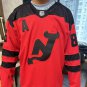 New Jersey Devils Men's 2024 Hockey Stadium Series Jack hughes Red Jersey
