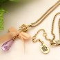 Juicy Couture Crown Purple Crystal Teardrop in Pink Bow Necklace