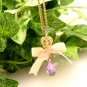 Juicy Couture Crown Purple Crystal Teardrop in Pink Bow Necklace