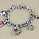 Juicy Couture Silvertone Music Charms Bracelet