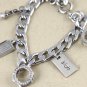 Juicy Couture Silvertone Music Charms Bracelet