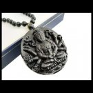 Buddhist rosary necklace with beads and round pendant in black obsidian stone Buddhist rosary necklace with beads and round pendant in black obsidian stone